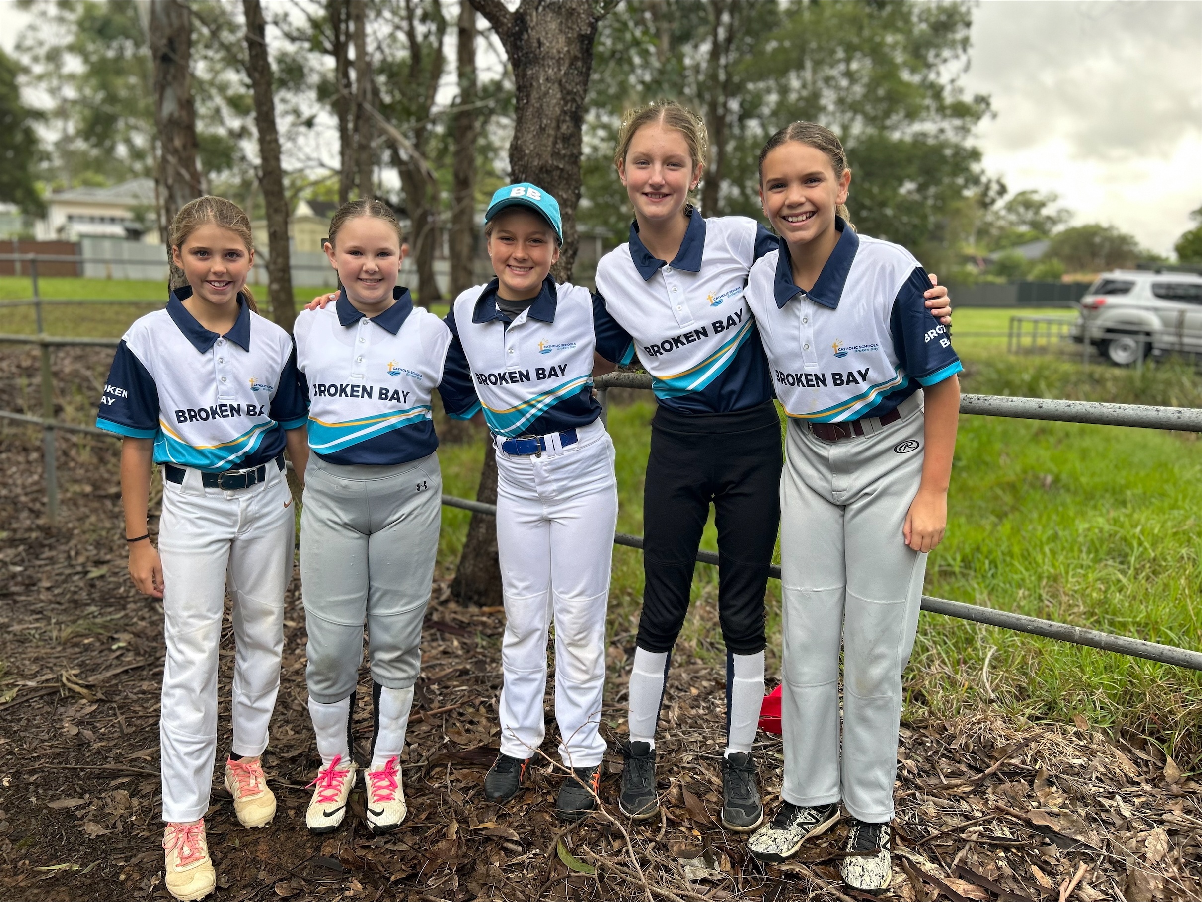 Girls polding softball